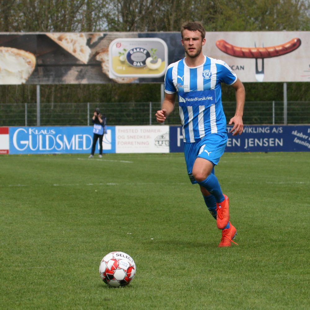 fodboldspiller og fotograf